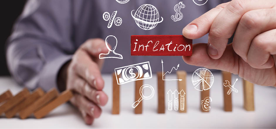 Business, Technology, Internet and network concept  Young businessman shows the word: Inflation 