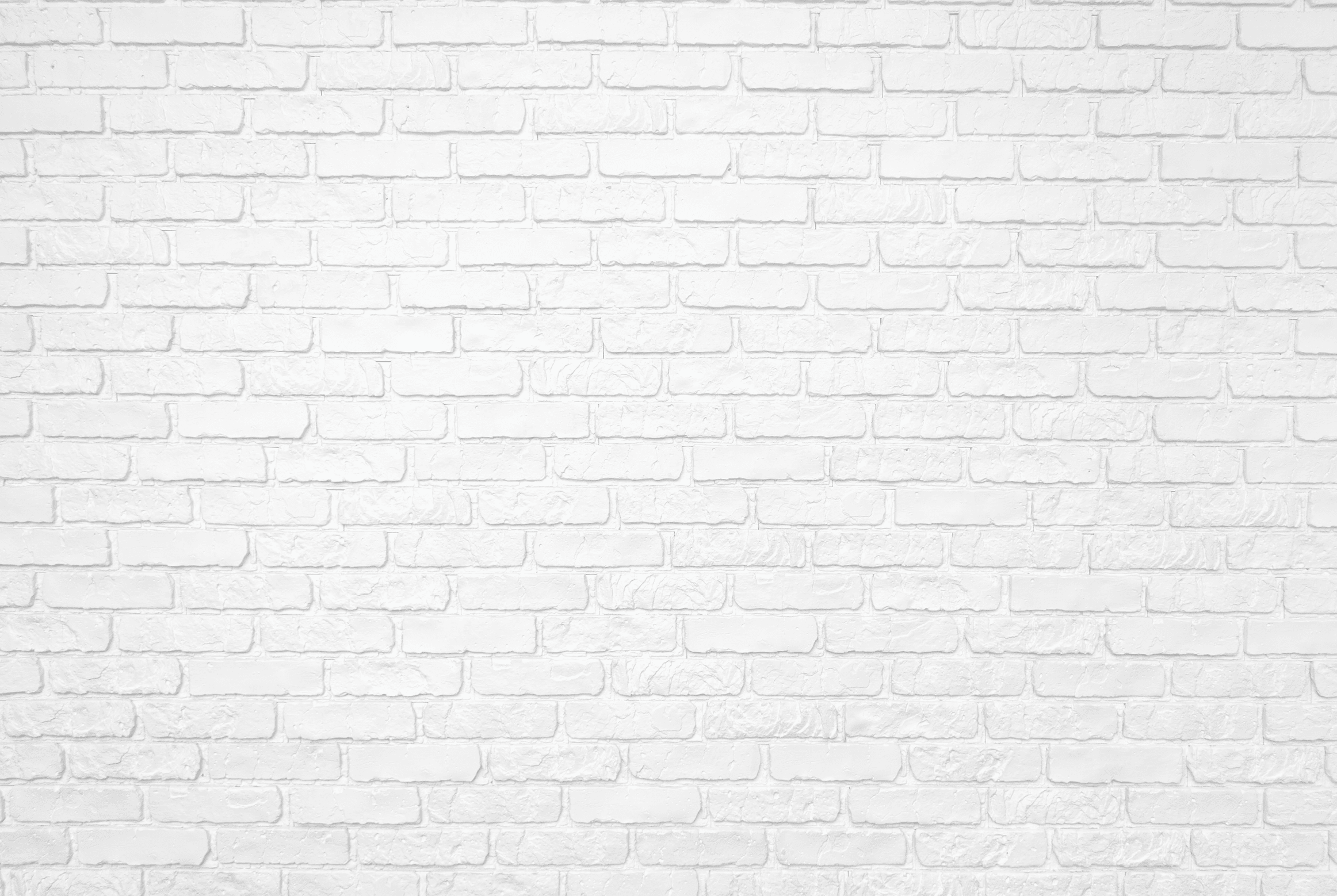 Photo of a white brick wall. Abstract background.